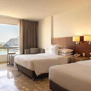 2 Double Beds City or Courtyard View Non-Smoking